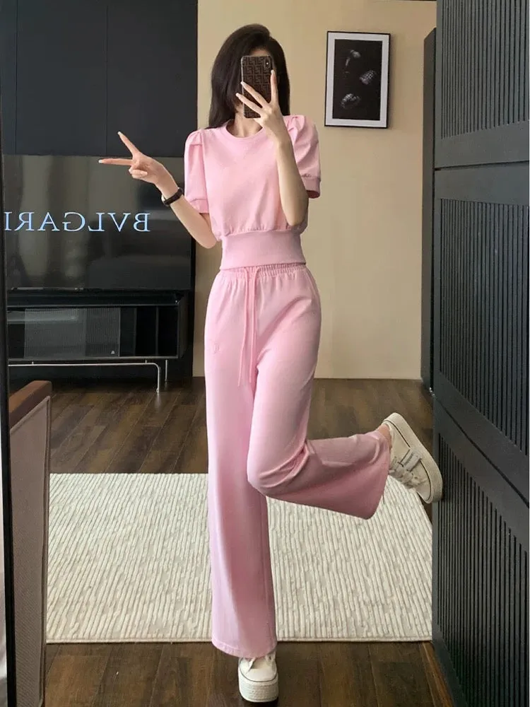 Pink sports and leisure suit for women summer 2024 new fashion age-reducing internet celebrity short-sleeved wide-leg pants two-