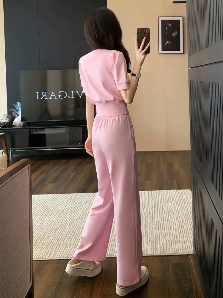 Pink sports and leisure suit for women summer 2024 new fashion age-reducing internet celebrity short-sleeved wide-leg pants two-